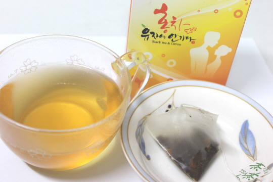 Black Tea with a Touch of Citron is made by mixing 100 % citron tea with fermented green tea at the ...
